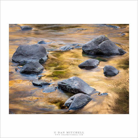 River rocks and autumn reflections