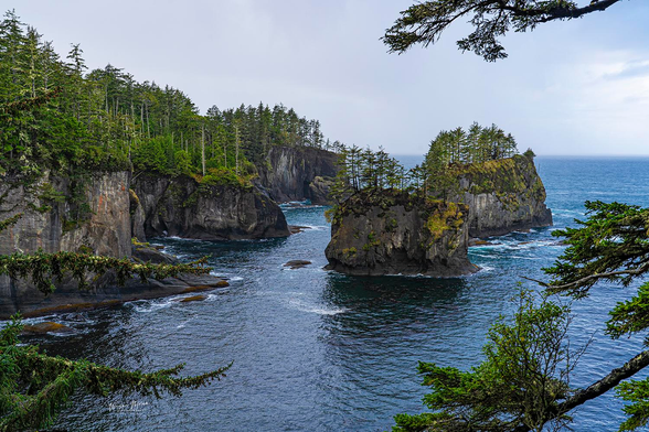 Iconic West Northwest View Cape Flattery Olympic Peninsula Washington

Cape Flattery, Washington – Where Land Meets the Infinite Sea

This breathtaking image captures the dramatic coastal seascape of Cape Flattery, the northwesternmost point of the contiguous United States. Located on the Makah Reservation at the tip of Washington’s Olympic Peninsula, Cape Flattery offers one of the most unforgettable views in the Pacific Northwest.

In the scene, towering basalt sea stacks rise from the deep blue waters where the Strait of Juan de Fuca meets the vast Pacific Ocean. The tree-covered cliffs, sculpted by centuries of wind and wave, are adorned with ancient Sitka spruce, moss, and lichen, creating a palette of rich greens and rugged grays. The prominent sea stack near the center is one of Cape Flattery’s most iconic features—majestic, mysterious, and timeless. Just beyond the cliffs lies Tatoosh Island, home to a historic lighthouse and significant to the Makah people for generations.

Image:
https://fineartamerica.com/featured/iconic-west-northwest-view-cape-flattery-olympic-peninsula-washington-wayne-moran.html

Read more:
https://waynemoranphotography.com/blog/pacific-northwest-photography-adventure-a-journey-through-natures-masterpieces/

#CapeFlattery #OlympicPeninsula #pacficNorthWest #Washington #landscape #nature #travelPHotogrpahy #Landscape #art #fineart 

#ayearforart #buyintoart