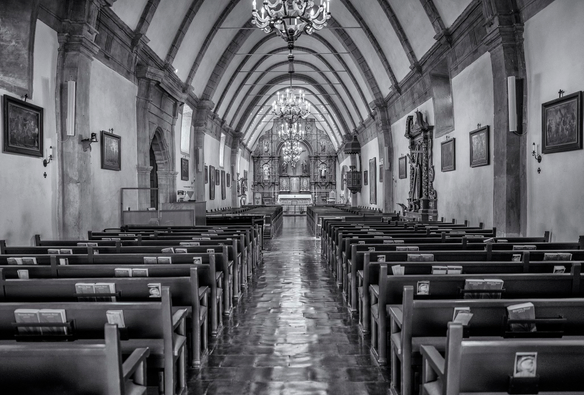 A look down the aisle of the Carmel Mission basilica toward the alter.