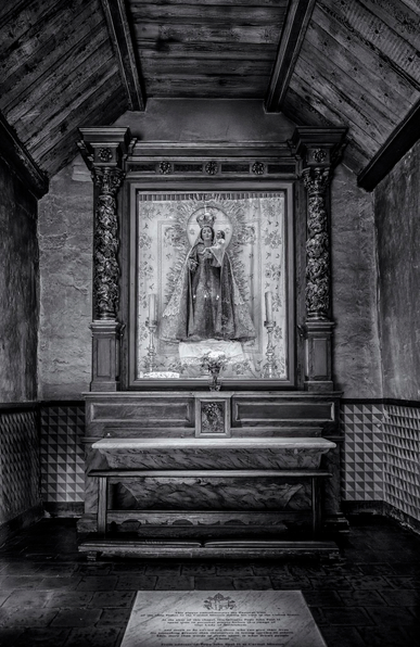 A third view of the votive candle area showing the shine to Our Lady of Bethlehem, the oldest statue of Mary in California. 
