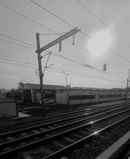 a photo from the train tracks from inside during a trip