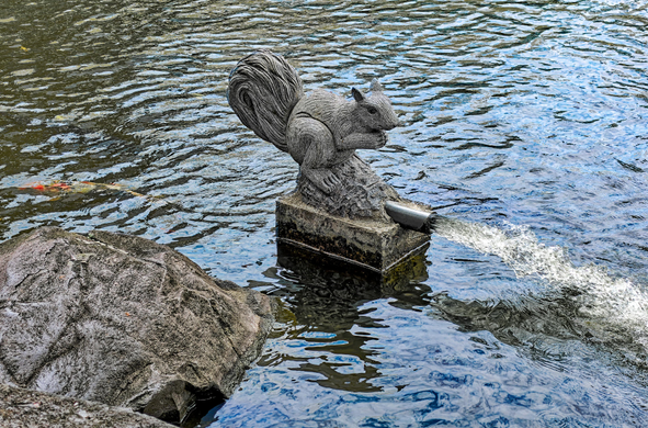 Pond spitter statue in the form of a squirrel.