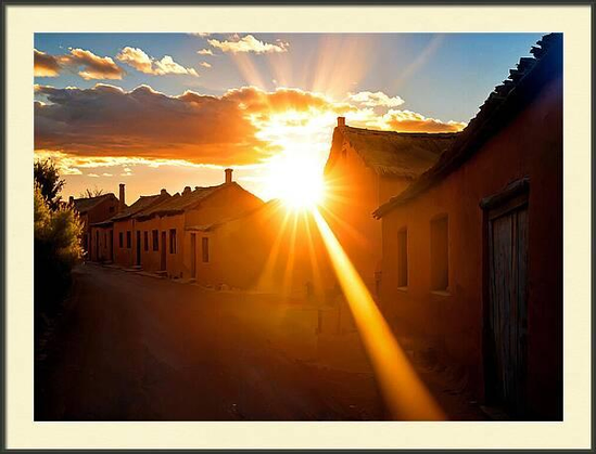 Sunshine in sunset over a village street framed print