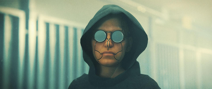 A young woman in her early 20s, wearing a greenish-grey hoodie and standing on a smoggy street with a building behind her.  She has a shaved head, and synthskin panels break up her face. Instead of eyes, she has two large circular mirrorshade lenses grafted to her sockets.  She doesn't look like she smiles much.