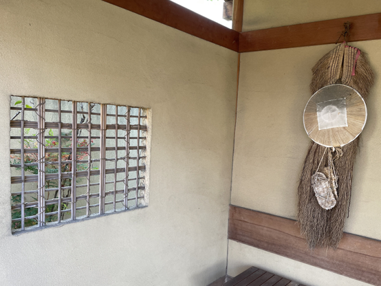 Part of the exterior is reminiscent of a traditional teahouse and a Buddhist temple with the pilgrim's outfit.