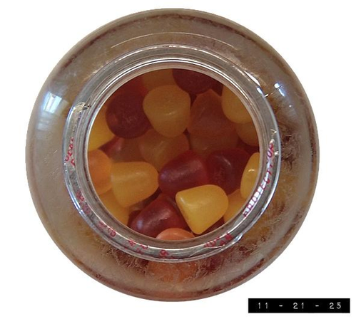 Top view of my bottle of vitamin D gummies.  Each gummy allegedly provides 2000 international units (50 mcg) of D3 but some days it only tastes like 1978 international units at best.  It's supposed to help keep me happy during the cold, dark months of winter but I think a good photo or two helps more.  If you've shared a good photo lately, thanks!  I'll try to return the favor by posting at least one good photo of my own sometime this month.  