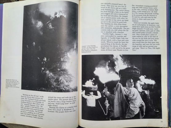 Photos of pages of the book. Images include masked men in robes carrying giant pyres. And a person lighting a large fire.
