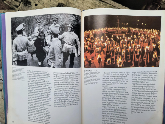 Another spread from the book, showing a ceremony where uniformed men have formed a star around a person's neck made of swords, and a giant ring of people holding torches, standing around a central point.