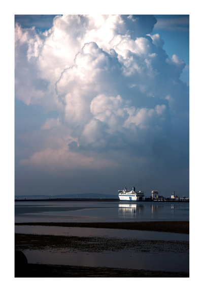 Thunderstorms between the islands.

The ferry "De Friesland" just arrived on time at the harbour on the Frisian island Terschelling. In the background the island Vlieland is visible.

Huge towering stormclouds above the UNESCO Wadden Sea.

Image by Jan Brons