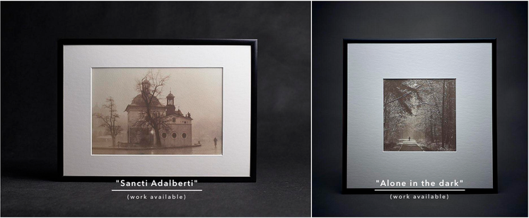 The image shows two argyrotype sepia prints, each framed in a black aluminium frame. One depicts a man walking down a long avenue through a forest; the other shows St Adalbert's Church in Krakow, shrouded in fog.