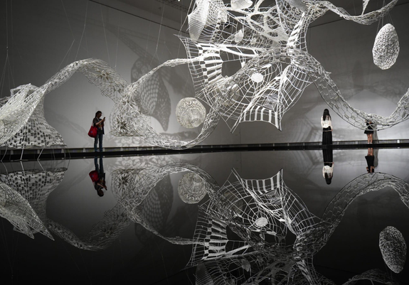 a large-scale installation of white fiber by Choi + Shine