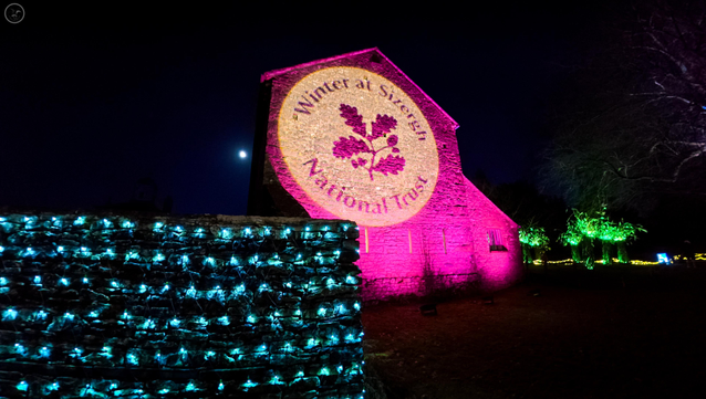 national trust light show on building wall