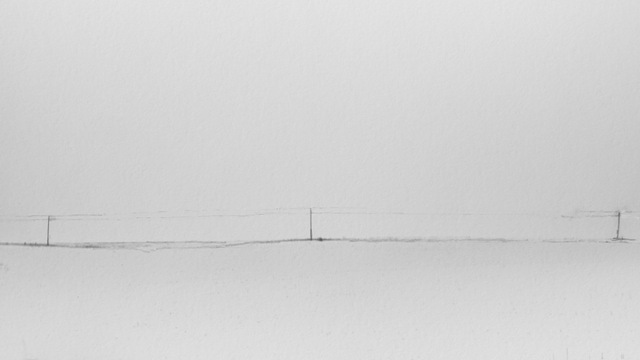 A wide snow-covered field beneath a pale, uniform sky. Thin power lines run horizontally across the image, supported by a few distant poles. The scene is sparse and softly textured.