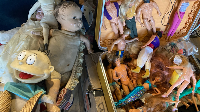 Box of store dolls