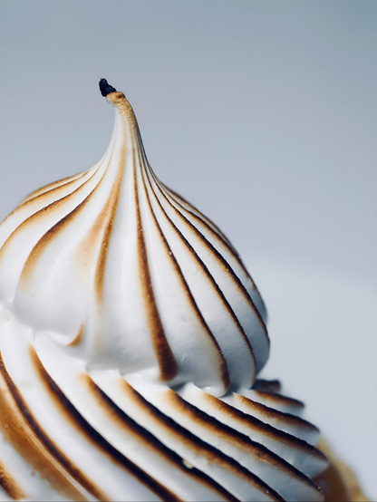 Swirl of browned meringue rises in a smooth peak, its soft texture matched by sumptuous sweetness.
Photograph by J. Watters