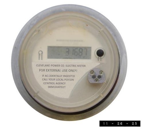 My electric meter (slightly modified in an attempt to keep myself awake while contemplating it).  