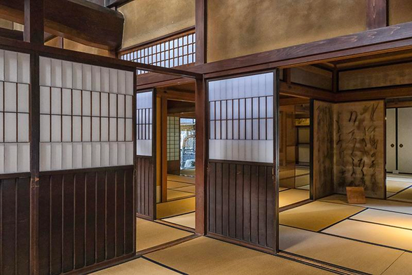 Interior of a typical original Japanese house with sliding doors and  tatami mats  in Takayama, Japan
