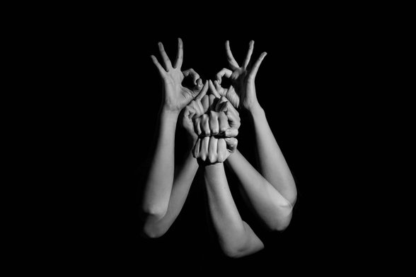 All hands. Multiple figures merge into a single presence, as though one mind were acting through many hands. 
Photograph by Molly Blackbird