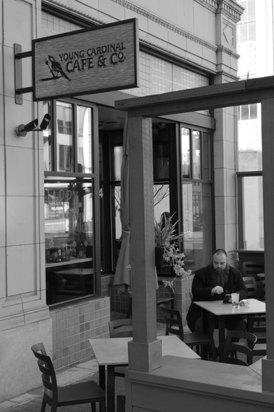 A shot of a cafe that had this dude framed, rather literally, in an interesting way.