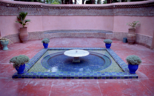 Fountain - a circle within a square. Blue tiles within red tiles.