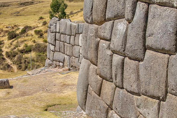 Sacsayhuaman - fortress in the north of Cusco - megalithic structures, the last stronghold of the Incas.

Sacsayhuamán is a citadel on the northern outskirts of the city of Cusco, Peru, the historic capital of the Inca Empire. Inca workers built these dry stone walls constructed of huge stones. The workers carefully cut the boulders to fit them together tightly without mortar. Cusco and Sacsayhuamán together were designated as sites on the UNESCO World Heritage List