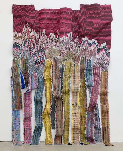 A large woven wall hanging by Kenny Nguyen made from strips of silk fabric