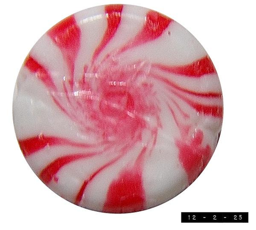 One genuine hard candy piece with red swirly stripes on a white base.  Peppermint flavor.  About an inch in diameter.  I removed the clear plastic wrapper before grabbing my camera in order to get a clearer picture.  (If photos of nude candy offend you, please let me know and I'll put up a Sensitive Content Warning next time.)  This photo still isn't as clear as I'd hoped because my hands tend to shake with excitement when I'm near sweet treats.  At least I managed to get this shot before the drool made photography impossible - which quite honestly is NOT what I expected.    