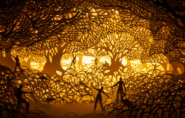 an illuminated paper cut scene by Hari and Deepti depicting tiny figures in a dense forest landscape