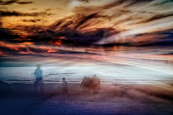 setting sun on the beach with matching Christmas colors