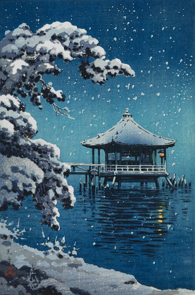 Winter at the Ukimido, Mangetsu-ji's floating temple hall, on a snowy evening. In the foreground, fresh snow weighs down the wiry branches of a pine tree and lies across the shore of Lake Biwa. Beyond, the Ukimido stands isolated on the surface of the lake, connected to the shore by a single narrow wooden bridge; more snow covers Ukimodo's curved rooftop. A single lantern burns in the little hall. The waters of Lake Biwa are calm; the horizon is lost in the gloom. Snow continues to fall across the scene.