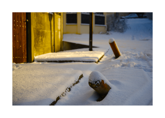 Daylight snowy photography

Objects and structures emerging from the snowy streets, strong morning sunny light.