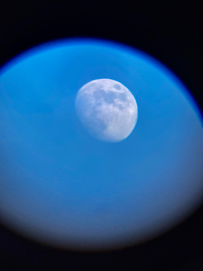The waxing gibbous moon in the early afternoon of January 10, 2025. Only a few days earlier, I remembered an old Celestron FirstScope that had been stashed away in our closet — just a small beginner’s telescope, a tabletop reflector with a 76mm (3-inch) aperture — and wondered if I could just hold my phone up to the eyepiece and take pictures that way. This was one of my halfway decent attempts, done with a handheld phone, before I realized I could buy an adapter to attach the phone more securely to the scope. But by then I also realized that if I truly wanted to take better moon photos, I’d have to invest in some better gear…