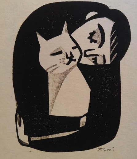 un homme serre dans ses bras le chat aimé