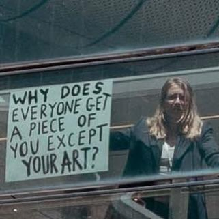 A sign saying: Why does everyone get a piece of you except your art?