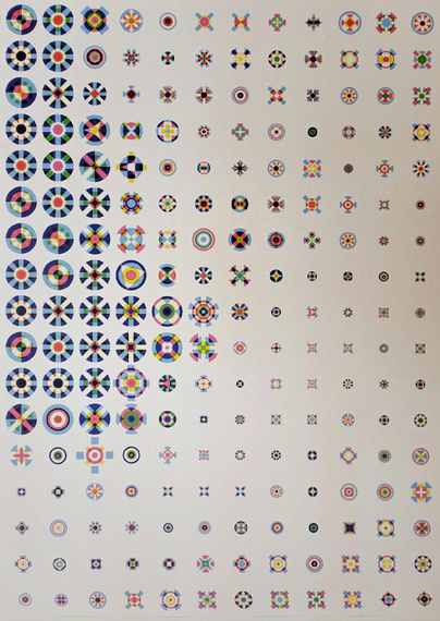 A photo showing a white canvas with a grid of colorful, geometric icons arranged in rows and columns. Each icon used parts of circles, dots, lines, and similar shapes in various colors.