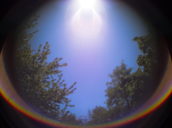 Sunenduced rainbows open apature