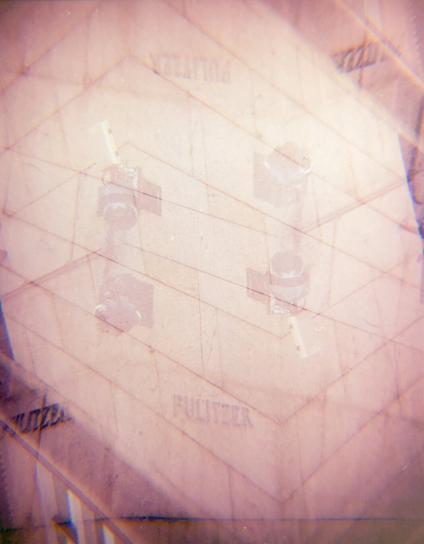 Multiple exposure showing surveillance cameras on the corner of Pulitzer building