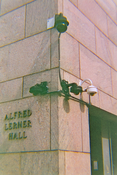 Surveillance cameras mounted at the corner of a building