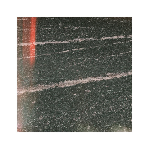 a square image showing abstract and very directional straight bright lines within a dark field. some red filtered in light leaks in different directions balance the otherwise almost monochrome composition