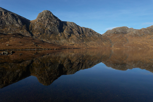 Sgùrr na Laocainn and Càrnan Bàn reflected in Dubh Loch.