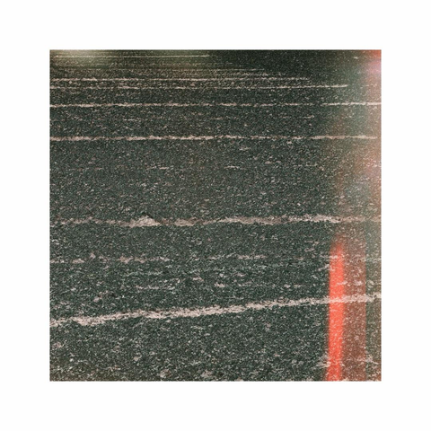 a square image showing abstract and very directional straight bright lines within a dark field. some red filtered in light leaks in different directions balance the otherwise almost monochrome composition
