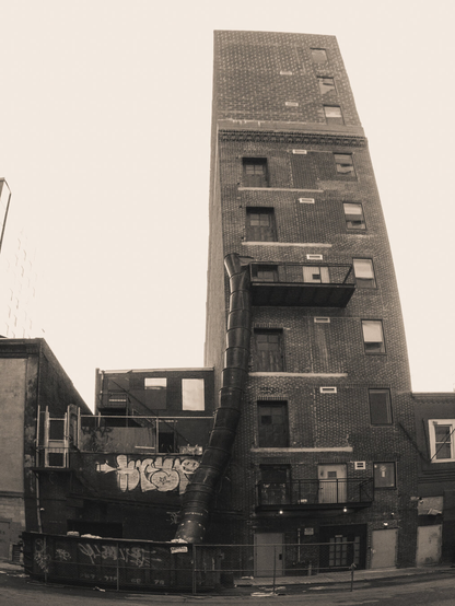 The back of a building alleyway