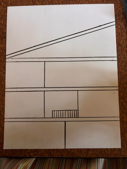 A white page with a simple black line outline of a house. 
