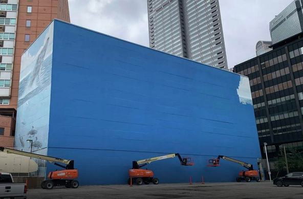 Gorgeous art, covered over by hideous blue pool paint. 
