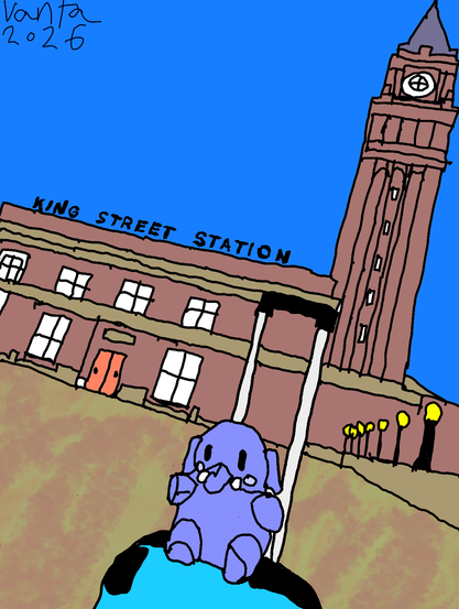 traced art of my plushtodon atop a luggage at king street station in seattle
