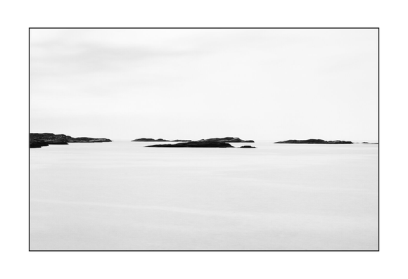 A few small rocks islands on the ocean. Golta, Norway