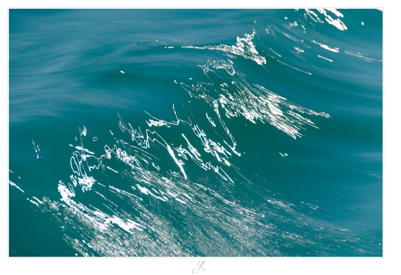 A view of the surface of a lake. Due to the long exposure time, the waves are transformed into a soft and gentle surface. The sun's reflections on the waves look like silver intricate lines, like being painted with a brush on the deep, petrol-colored water. There is nothing as the water surface and the reflections.

AI disclaimer: Using my work, its meta data, written or derived description to create media with or train AI based systems is prohibited.