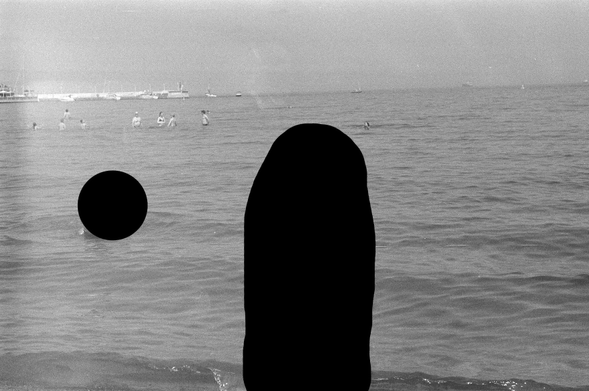black and white photo with a white spot