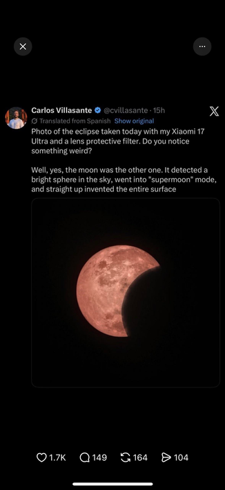 Screenshot of a post on X by Carlos Villasante, showing a picture of the August 12, 2026 solar eclipse — except the sun is displaying lunar craters. Text translated from Spanish reads: “Photo of the eclipse taken today with my Xiaomi 17
Ultra and a lens protective filter. Do you notice something weird? Well, yes, the moon was the other one. It detected a bright sphere in the sky, went into "supermoon" mode, and straight up invented the entire surface.”