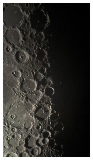 Closeup of Luna’s cratered surface. The terminator line dividing lunar day from night runs vertically through the image, bringing out the highlights and shadows of the craters.

Shot on an iPhone 15 attached to a Celestron 130mm-aperture reflector telescope.